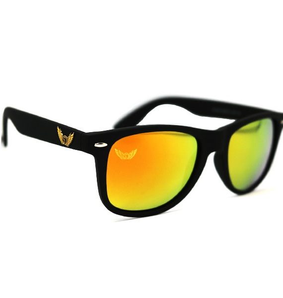 SIde view of orange polarized sunglasses by Shari Dionne. The Turner shades have a wayfarer style design