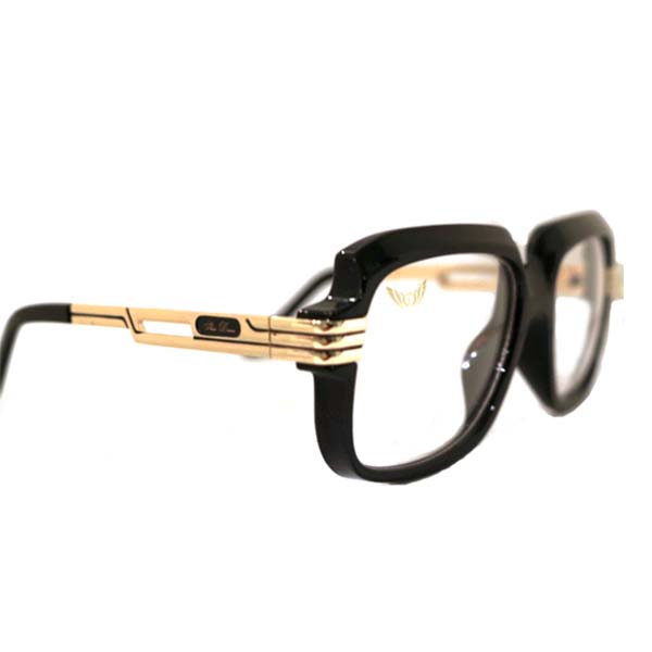 Shari Dionne Big Meech Eyewear with clear lens and black and gold frame side view
